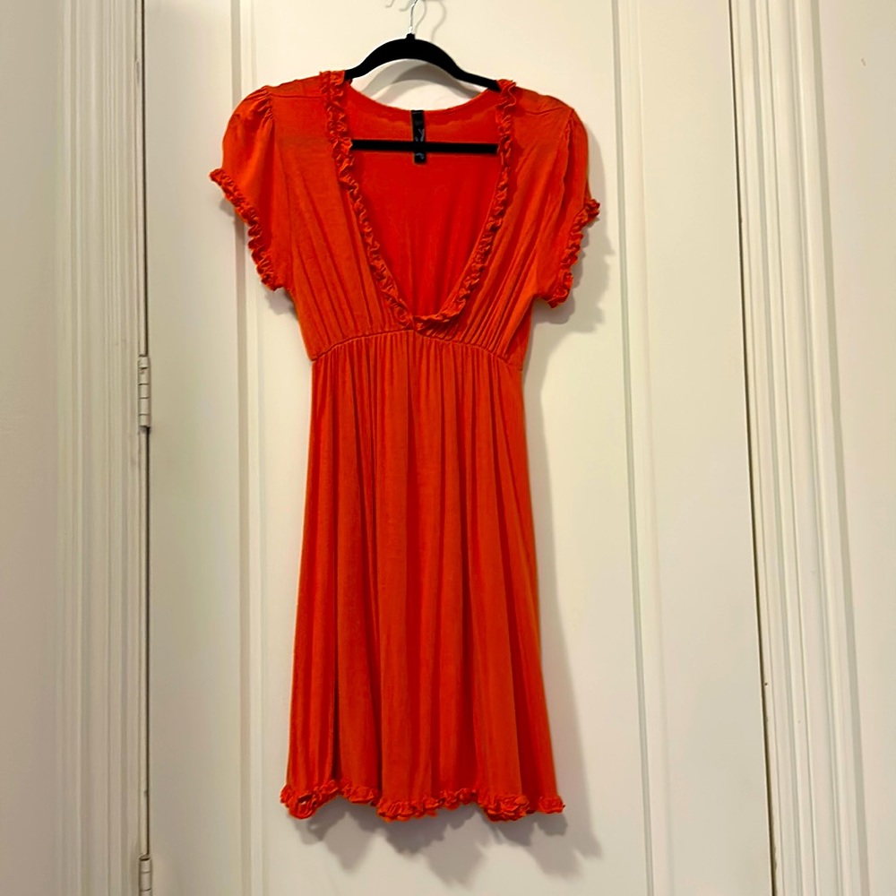 Orange spring dress - flowing cotton feel. Knee length. Cute ruffle trim.
